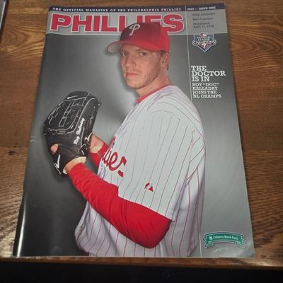 LOT 156: Pride of the Phillies Pictures, 2009 Philadelphia Phillies Yearbook, and More