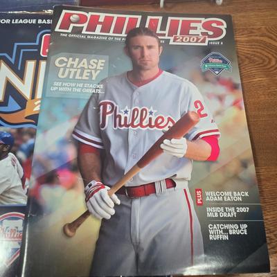 LOT 156: Pride of the Phillies Pictures, 2009 Philadelphia Phillies Yearbook, and More