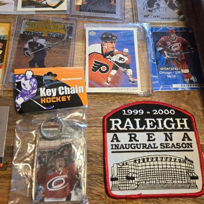 LOT 157: Hockey Cards Featuring Lindros, LeClair, Boucher, and More/ Rod Brind'Amour Autographed Photo with COA, Cards, Bobble Head,...