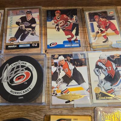 LOT 157: Hockey Cards Featuring Lindros, LeClair, Boucher, and More/ Rod Brind'Amour Autographed Photo with COA, Cards, Bobble Head,...