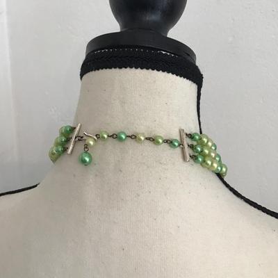 Sale Photo Thumbnail #134: Beautiful vintage, triple strand necklace with beads shades of different green and cream. Please see attached photos.