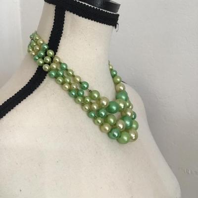 Sale Photo Thumbnail #133: Beautiful vintage, triple strand necklace with beads shades of different green and cream. Please see attached photos.