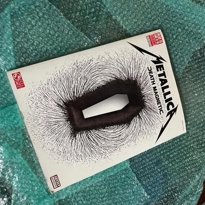 "Play It Like It Is" drum sheet music book for Metallica's album Death Magnetic.