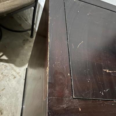 Dark wood nightstand or bedside table