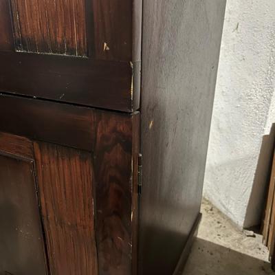 Dark wood nightstand or bedside table