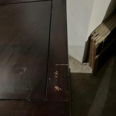 Dark wood nightstand or bedside table