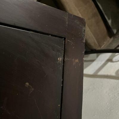 Dark wood nightstand or bedside table