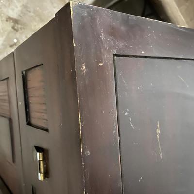 Dark wood nightstand or bedside table