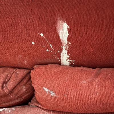 Red L-shaped sectional sofa with a chaise lounge