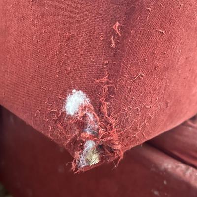 Red L-shaped sectional sofa with a chaise lounge