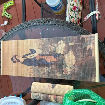 Vintage hanging bamboo scroll featuring Japanese geisha art