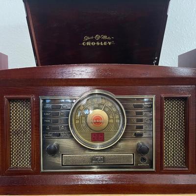 Sale Photo Thumbnail #13: one speaker fabric is frayed, works, play records cds, radio and tapes
Does not come with wood stand