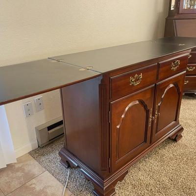 Sale Photo Thumbnail #68: Stunning Thomasville sideboard/buffet cabinet
has floral layment down for protection!