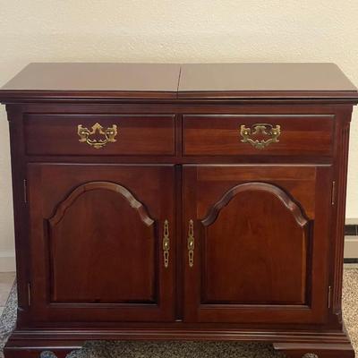 Sale Photo Thumbnail #63: Stunning Thomasville sideboard/buffet cabinet
has floral layment down for protection!