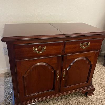 Sale Photo Thumbnail #65: Stunning Thomasville sideboard/buffet cabinet
has floral layment down for protection!