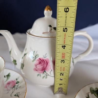 Tea Pot and Tea Cups.