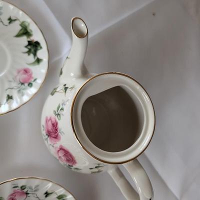 Tea Pot and Tea Cups.