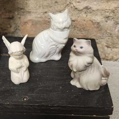 Sale Photo Thumbnail #58: Couple of Avon cats a small Goebel angel, a Siamese paperweight and a cute little lamp