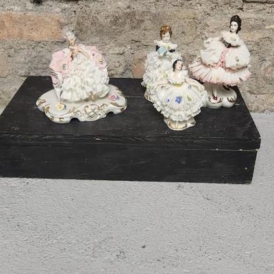 Sale Photo Thumbnail #64: Really neat porcelain ruffles figures. These are super delicate and they all have some damage. Lot 1