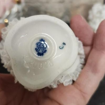 Sale Photo Thumbnail #70: Really neat porcelain ruffles figures. These are super delicate and they all have some damage. Lot 1