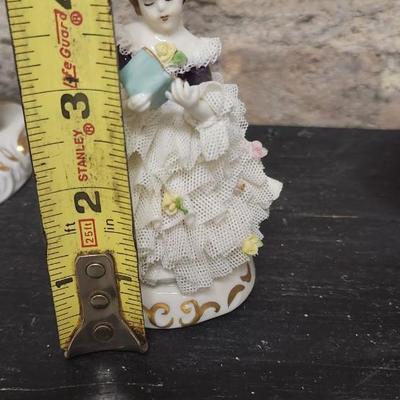 Sale Photo Thumbnail #72: Really neat porcelain ruffles figures. These are super delicate and they all have some damage. Lot 1