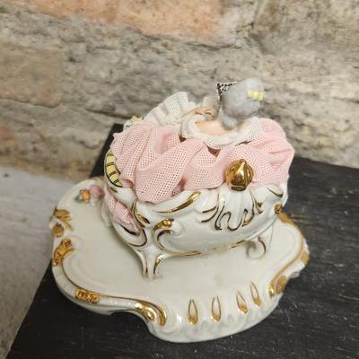 Sale Photo Thumbnail #68: Really neat porcelain ruffles figures. These are super delicate and they all have some damage. Lot 1