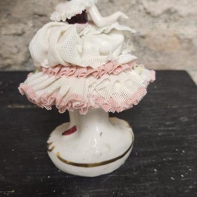 Sale Photo Thumbnail #76: Really neat porcelain ruffles figures. These are super delicate and they all have some damage. Lot 1