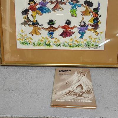 Sale Photo Thumbnail #203: A touch of Indian book and framed artwork.