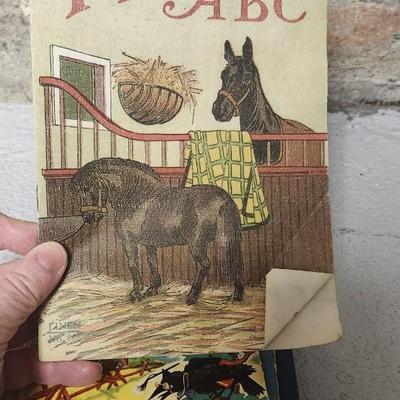 Sale Photo Thumbnail #242: A conglomeration of books.