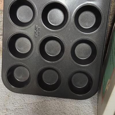 Sale Photo Thumbnail #264: Popiel crepe pan, malt blender, small Mandolin, salt and pepper and mini muffin tin