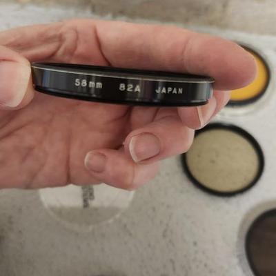 Sale Photo Thumbnail #424: Lot of 8 - 58 mm filters. Fits small flat rate box