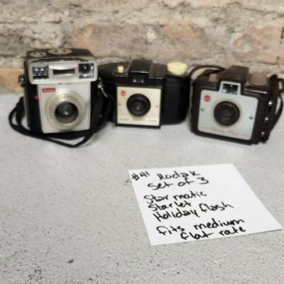 Sale Photo Thumbnail #431: Set of 3 Kodak cameras. Starmatic, starlet and Holiday Flash. Fits a medium flat rate box