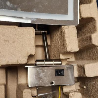 Sale Photo Thumbnail #529: 2 luxury lighted mirrors. Looks like one install was attempted but the other is brand new in the box with instructions etc. hardware appears to be there for both