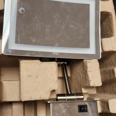 Sale Photo Thumbnail #528: 2 luxury lighted mirrors. Looks like one install was attempted but the other is brand new in the box with instructions etc. hardware appears to be there for both