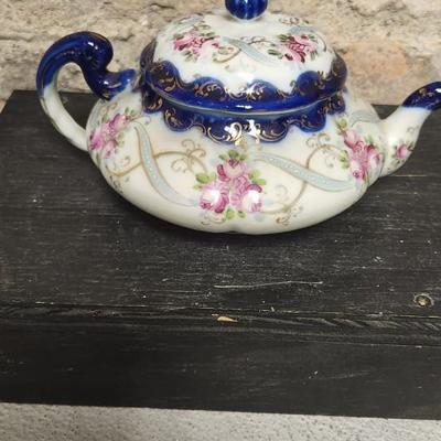 Sale Photo Thumbnail #593: Three pieces of Candlewick and two really great old pots