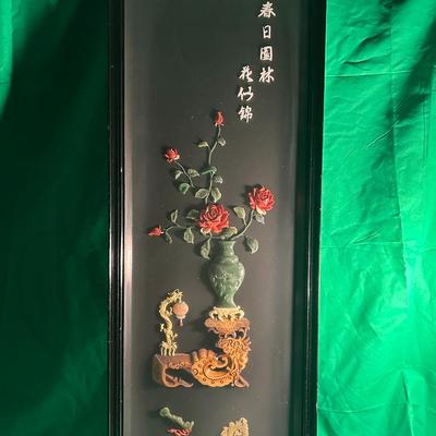 Sale Photo Thumbnail #56: Framed Chinese  panel featuring a floral vase design with red and green hues. The embroidery includes intricate floral patterns and Chinese characters displayed vertically along the side. The panel is encased in a glass-fronted black wooden frame. Fine cr