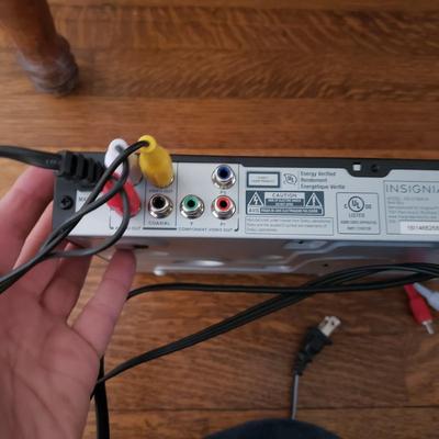 Insignia DVD Player W/Remote and DVDS (D-KD)