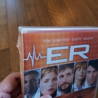 Insignia DVD Player W/Remote and DVDS (D-KD)