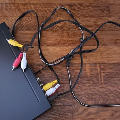 Insignia DVD Player W/Remote and DVDS (D-KD)