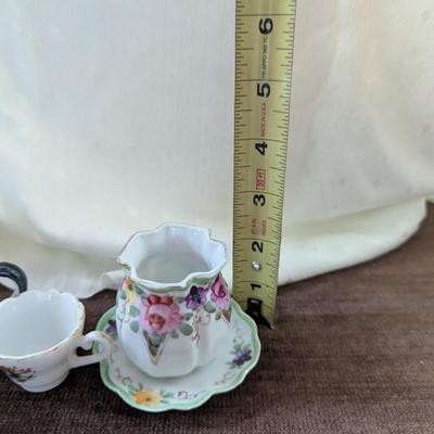 Miniature tea party creamer,pitchers, tea cup,toothpick holder.
