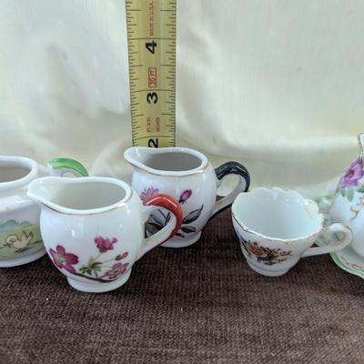 Miniature tea party creamer,pitchers, tea cup,toothpick holder.