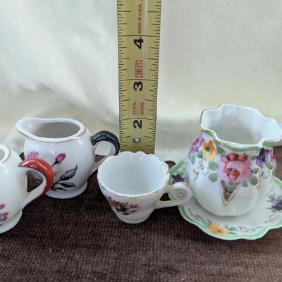 Miniature tea party creamer,pitchers, tea cup,toothpick holder.