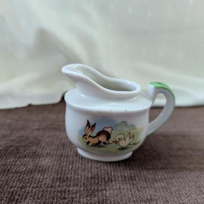 Miniature tea party creamer,pitchers, tea cup,toothpick holder.
