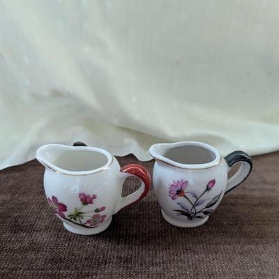 Miniature tea party creamer,pitchers, tea cup,toothpick holder.