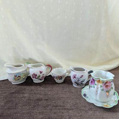 Miniature tea party creamer,pitchers, tea cup,toothpick holder.