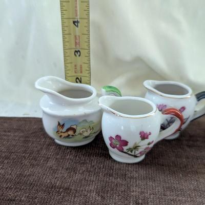 Miniature tea party creamer,pitchers, tea cup,toothpick holder.