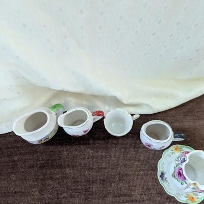 Miniature tea party creamer,pitchers, tea cup,toothpick holder.