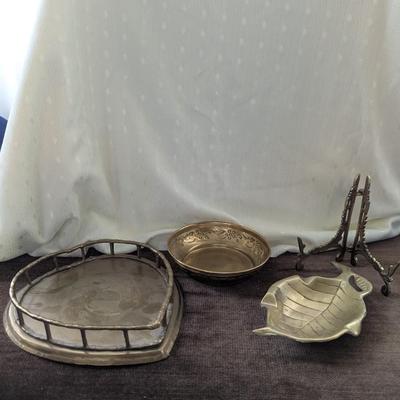 Group of four brass pieces