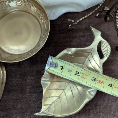 Group of four brass pieces