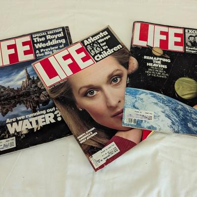 Three Life Magazines.